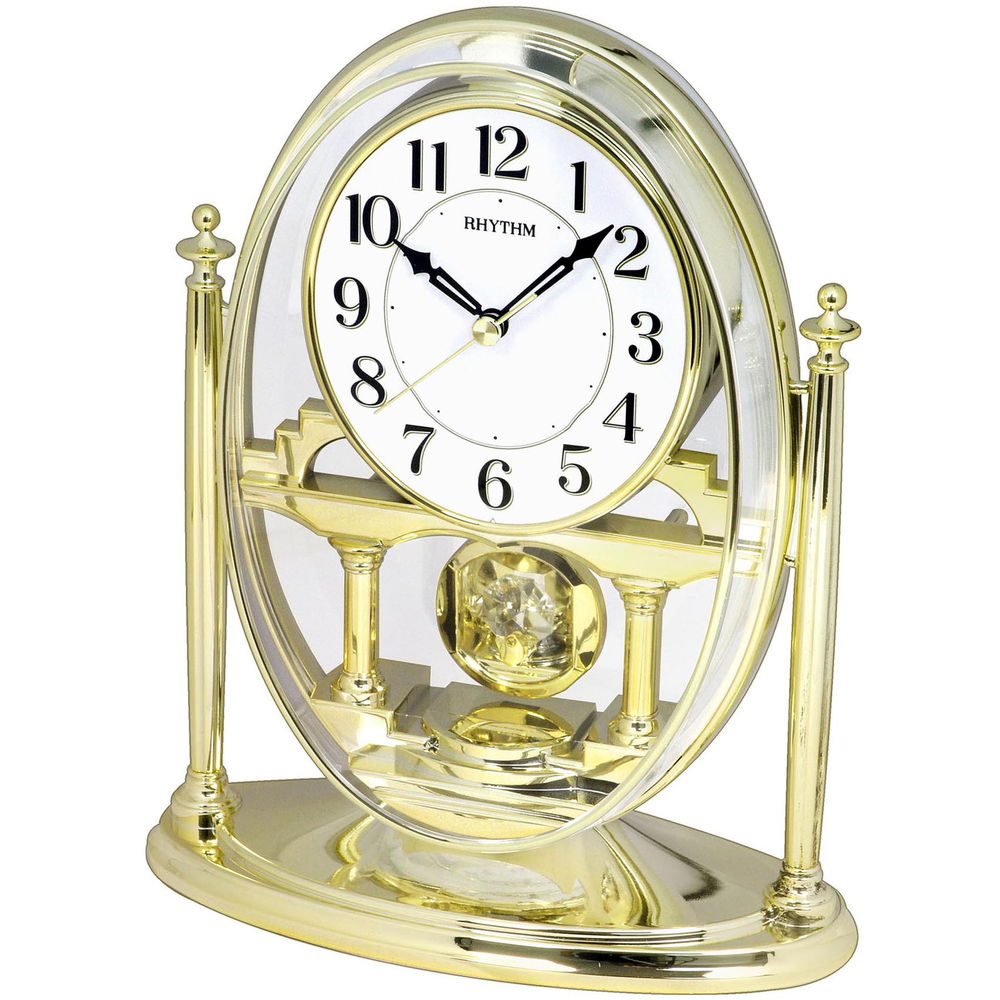 Rhythm 7609 9 Tischuhr Quarz Mit Pendel Geh use Goldfarben Rhythm 7609 9 Tischuhr Quarz Mit Pendel Geh use Goldfarben