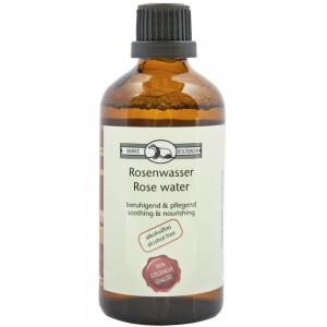 Golddachs Rosenwasser in Glasflasche